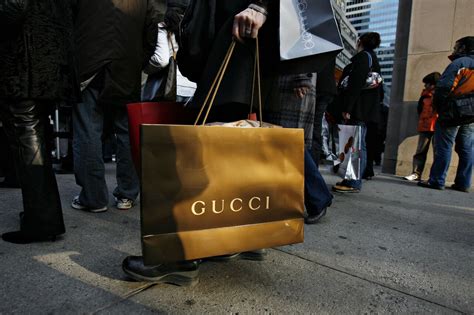 gucci buys swisher|gucci and kering sales.